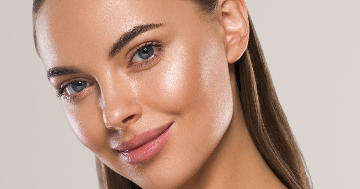 Woman with glowing, youthful skin showcasing the results of PRF_EZ Gel Treatment in Astoria, NY.