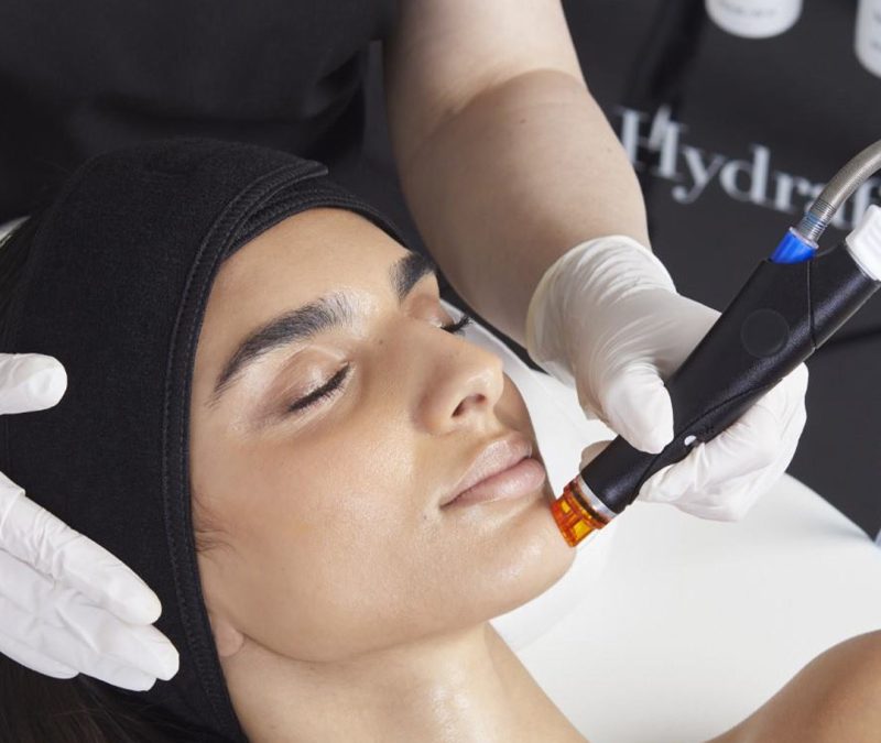 Young Girl Receiving Hydrafacial Treatment on Her Face | Just Glam Aesthetics in Astoria, NY